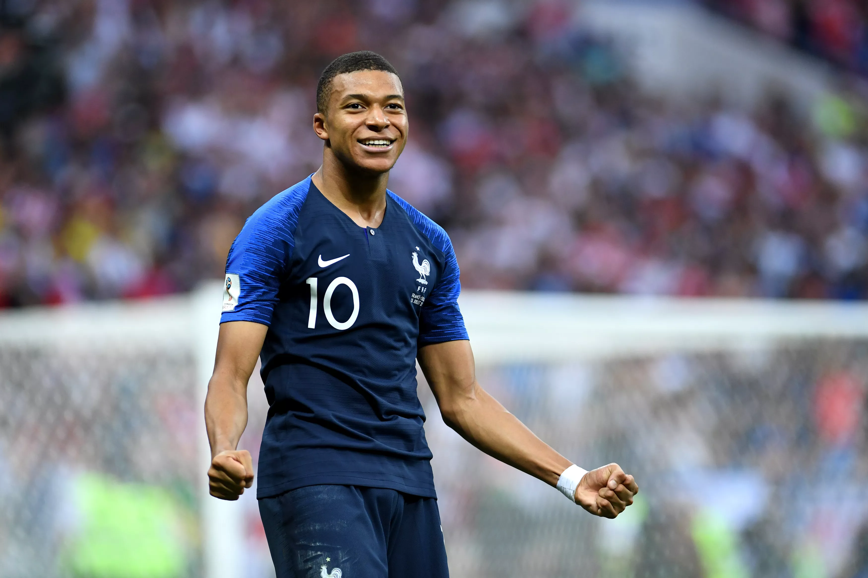 Football player celebrating in French national team jersey